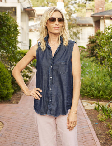 Front of person wearing Distressed Rinse Frank & Eileen Fiona Sleeveless Button-Up Shirt in Famous Denim