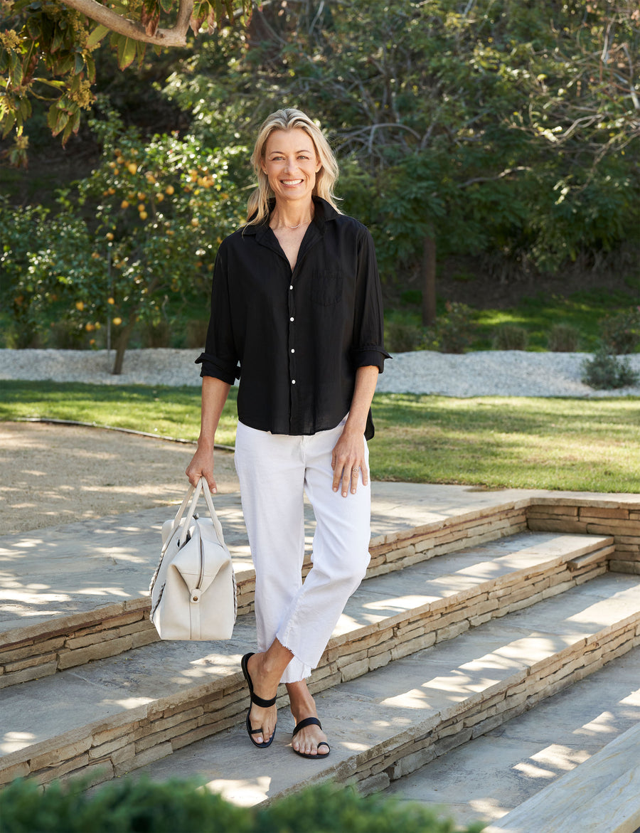 Person outside wearing Black Frank & Eileen Eileen Relaxed Button-Up Shirt in Organic Voile