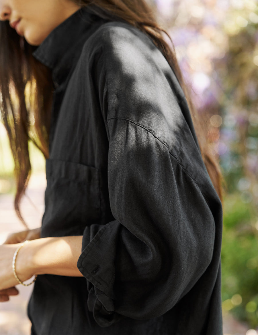 Detail of exaggerated sleeve on person wearing Black Frank & Eileen Mackenzie One-Size Button-Up Shirt in Lived-in Linen