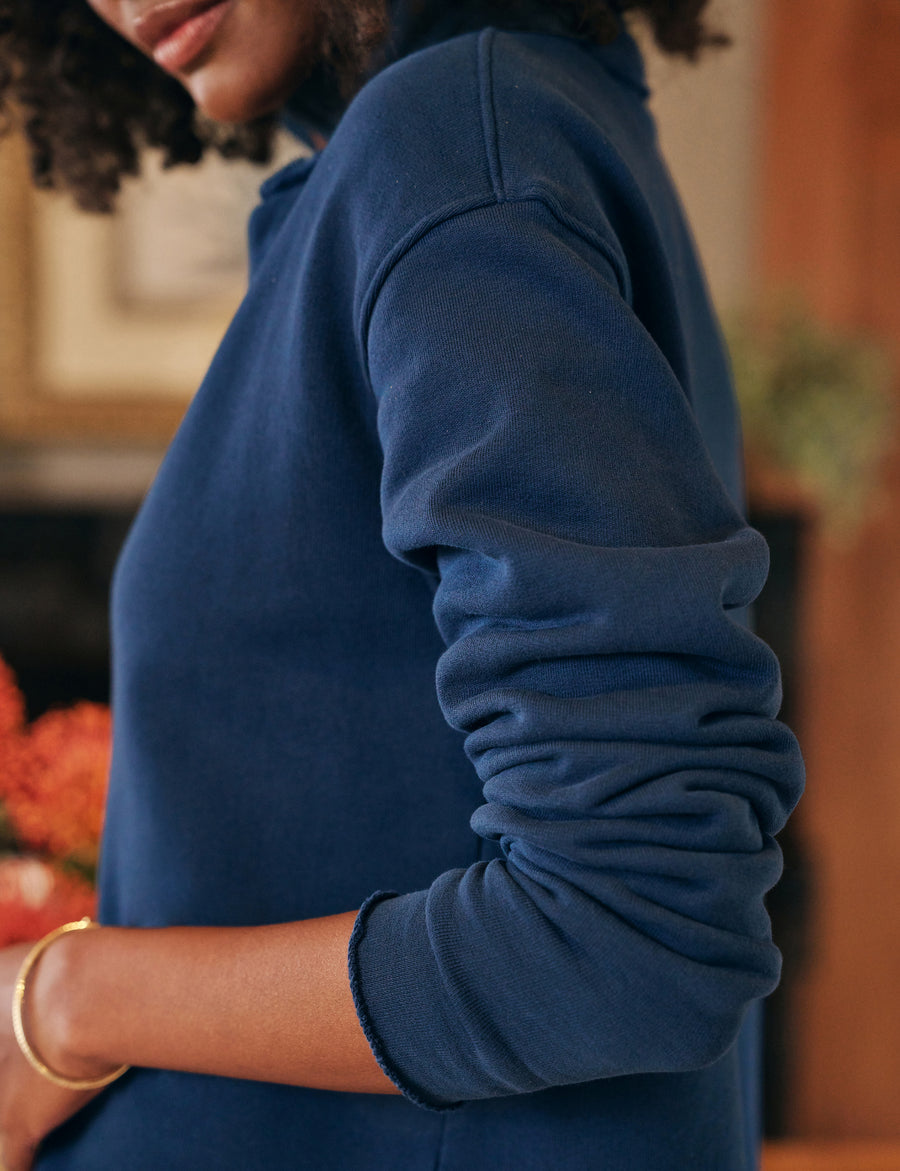 Detail of sleeve on person wearing Blue Frank & Eileen Patrick Popover Henley in Triple Fleece