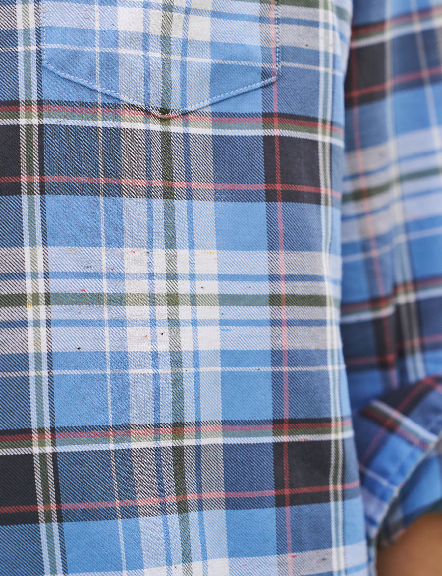 Detail of flecked plaid patter on person wearing Blue Plaid Frank & Eileen Eileen Relaxed Button-Up Shirt in Flannel