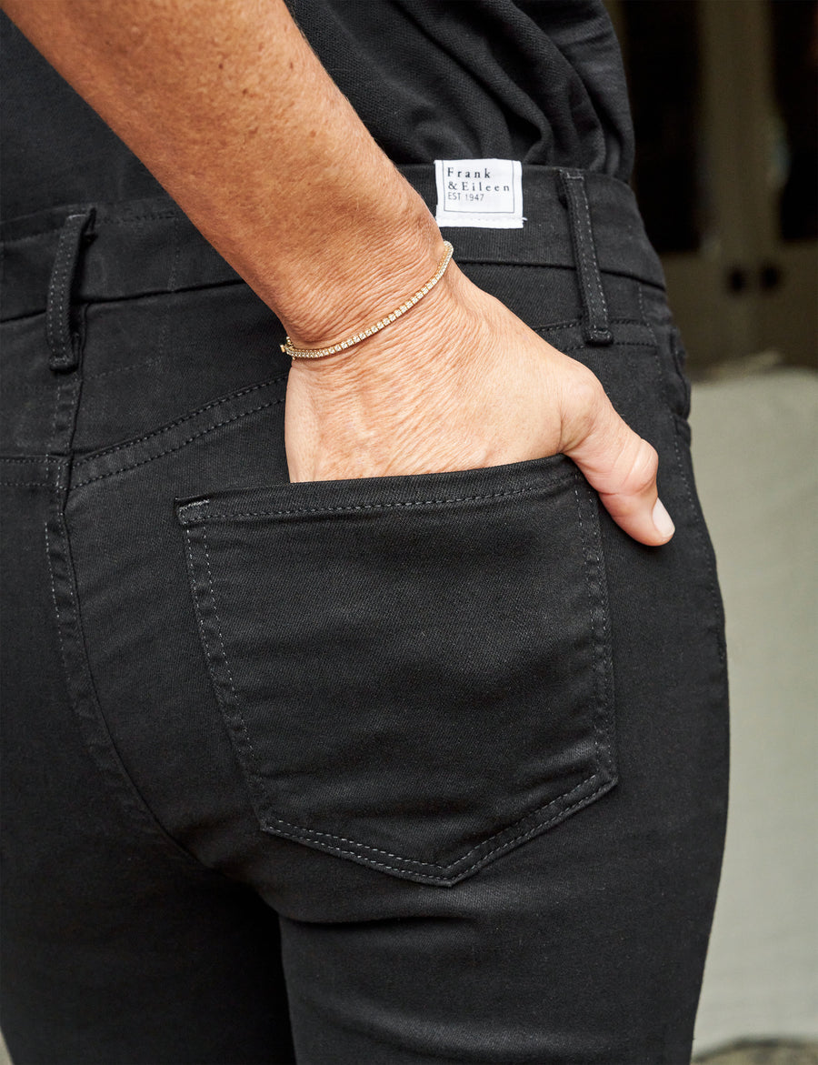 Detail of back pocket on person wearing Jet Black Frank & Eileen Sligo Skinny Jean made in Italian Performance Denim