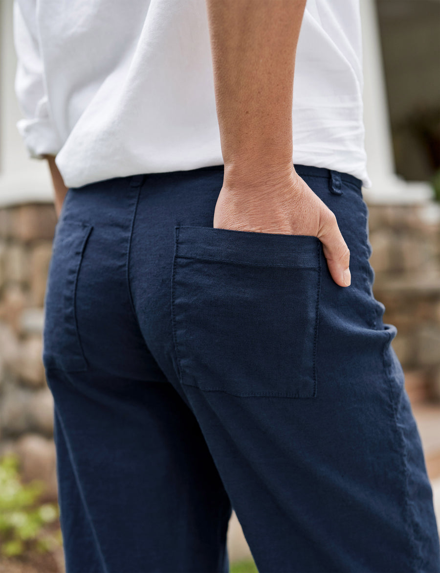 Detail of back pocket on person wearing Navy Frank & Eileen Kinsale High-Rise Pant in Italian Performance Linen