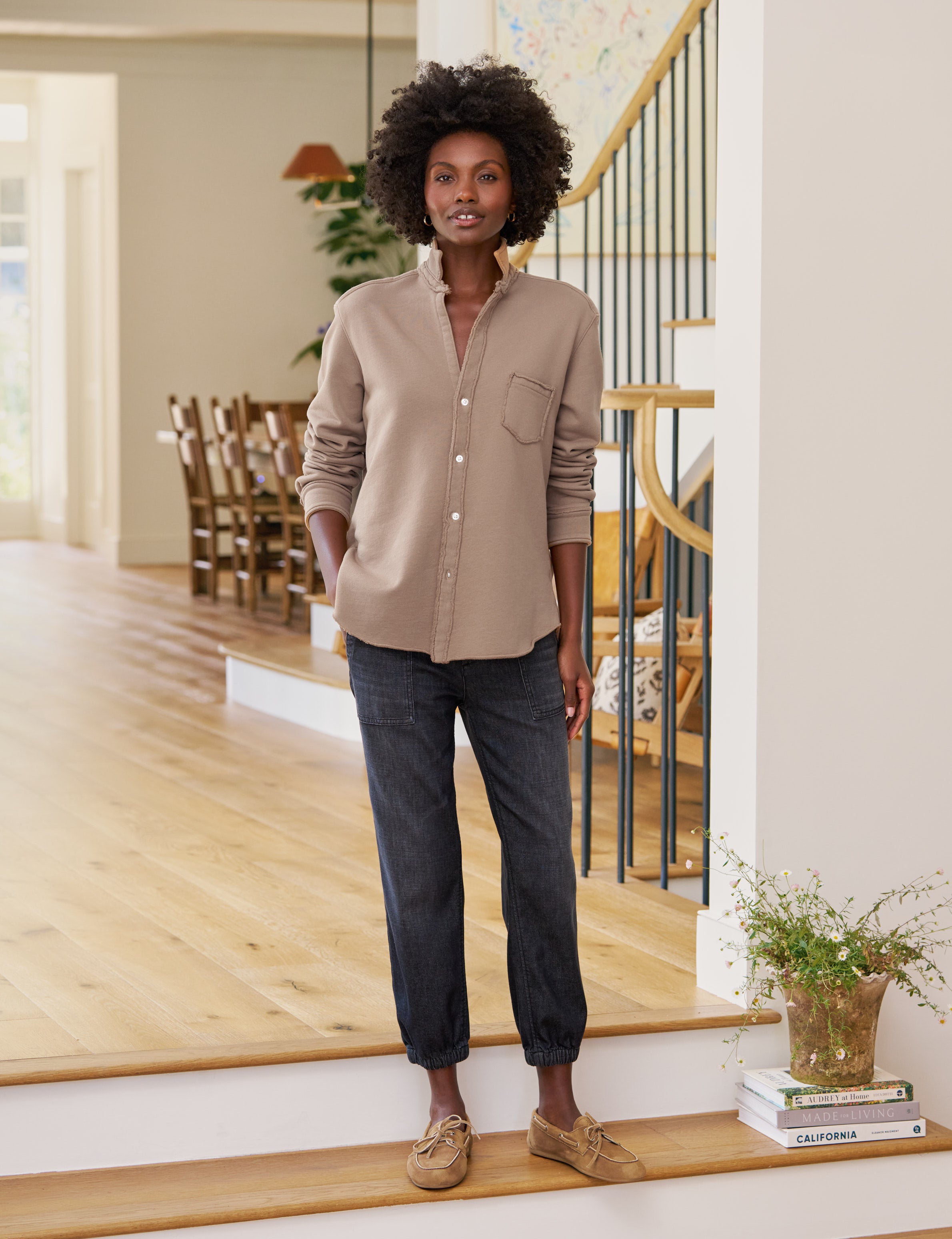 Woman standing in a modern home interior