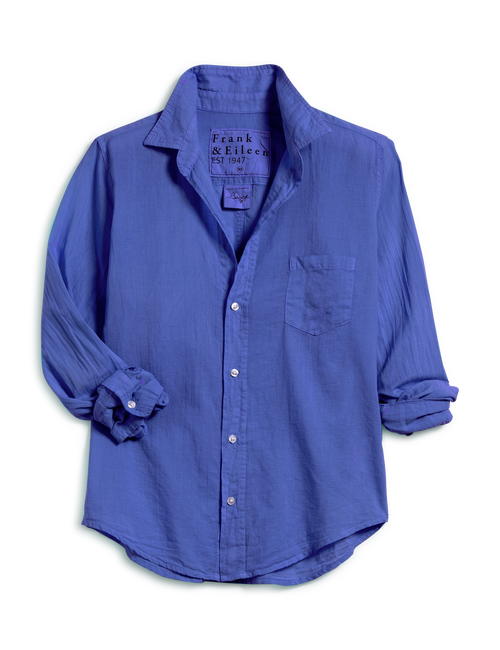 A blue long-sleeve button-down shirt by Frank & Eileen, featuring a chest pocket and rolled-up sleeves, displayed on a clean white background., front view