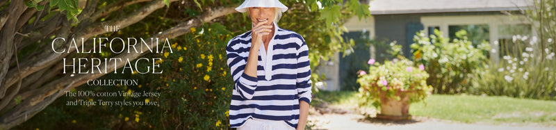 A person wearing a white sun hat and a navy and white horizontally striped shirt stands outdoors in a garden setting, with the text THE CALIFORNIA HERITAGE COLLECTION overlaid on the left side.