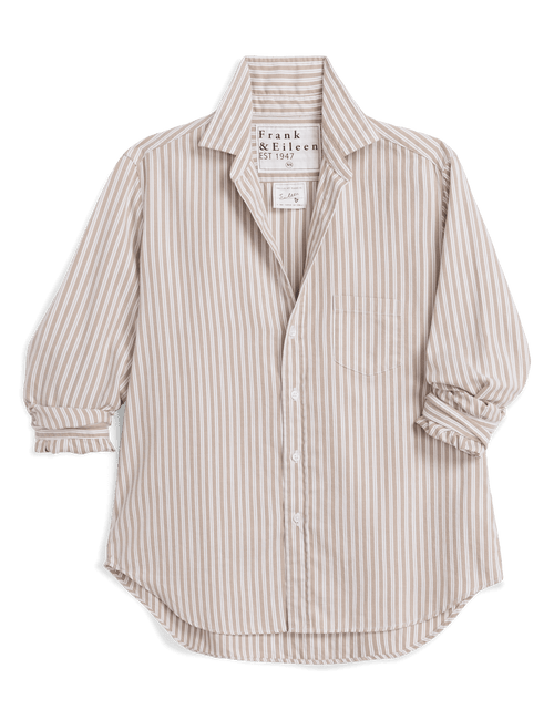 A long-sleeve button-up shirt by Frank & Eileen, featuring vertical beige and white stripes, a chest pocket, and ruffled cuffs, laid flat on a white background., front view