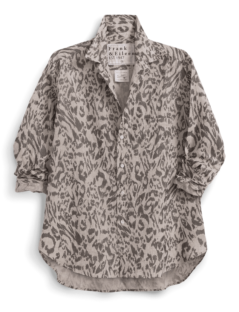Leopard print shirt with a brand label on a green background