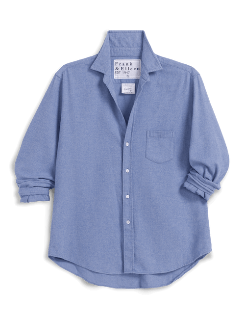 A light blue long-sleeve button-up shirt by Frank & Eileen, featuring a pointed collar, a chest pocket, and rolled cuffs, displayed against a solid black background., view 4
