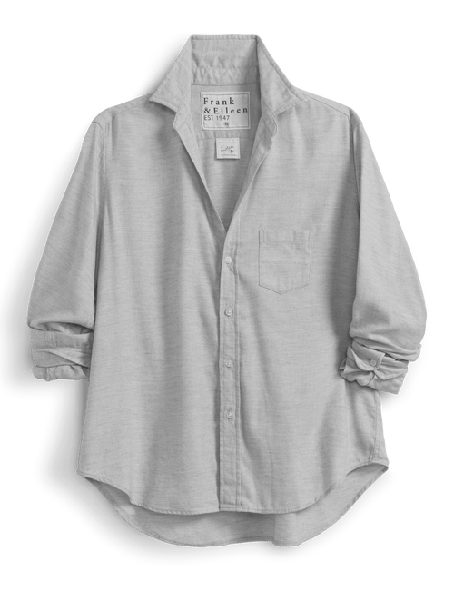 Light gray button-up shirt with rolled-up sleeves on a green background, view 4