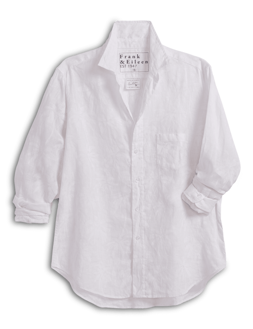 White shirt with a brand label on a green background, view 4