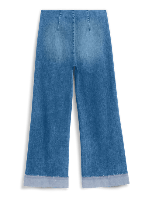 A pair of wide-leg cropped jeans in a medium blue denim wash, featuring a raw, frayed hem, shown against a solid black background., view 6