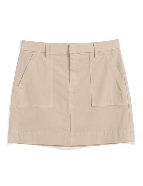 A light beige utility mini skirt with belt loops, a front fly, and two large front patch pockets, shown flat on a white background., view 4