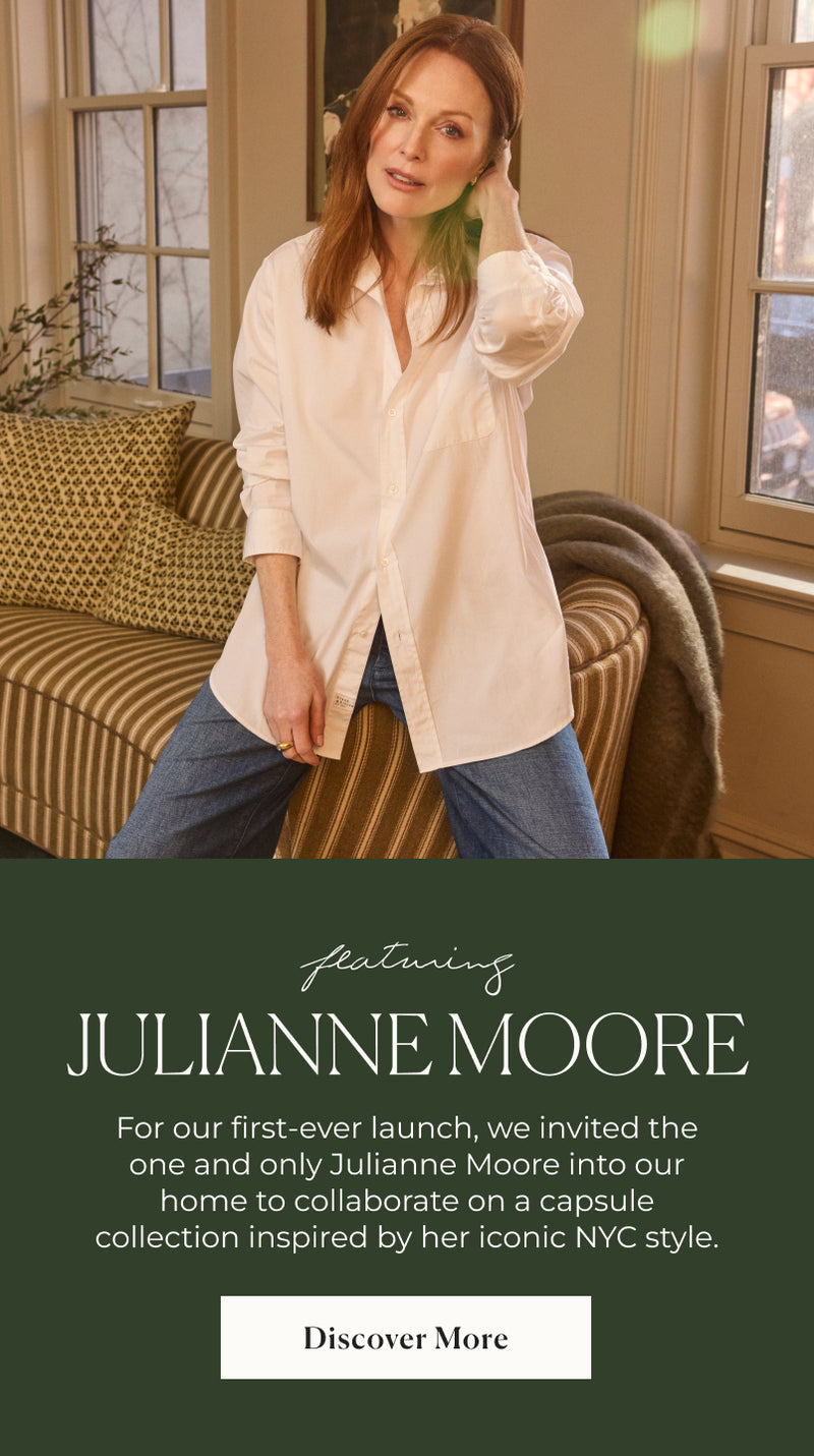 Woman in a beige shirt and jeans standing in a living room with text about Julianne Moore's capsule collection.
