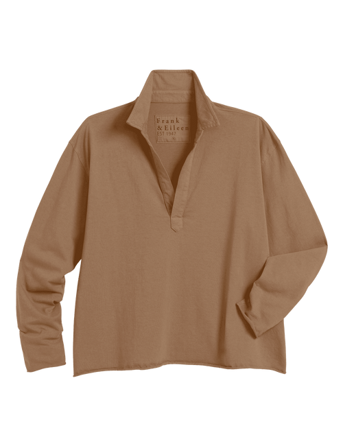A long-sleeve polo-style shirt in a warm tan or camel color, shown flat against a solid green background. The inner neck label reads 'Frank & Eileen'., view 6