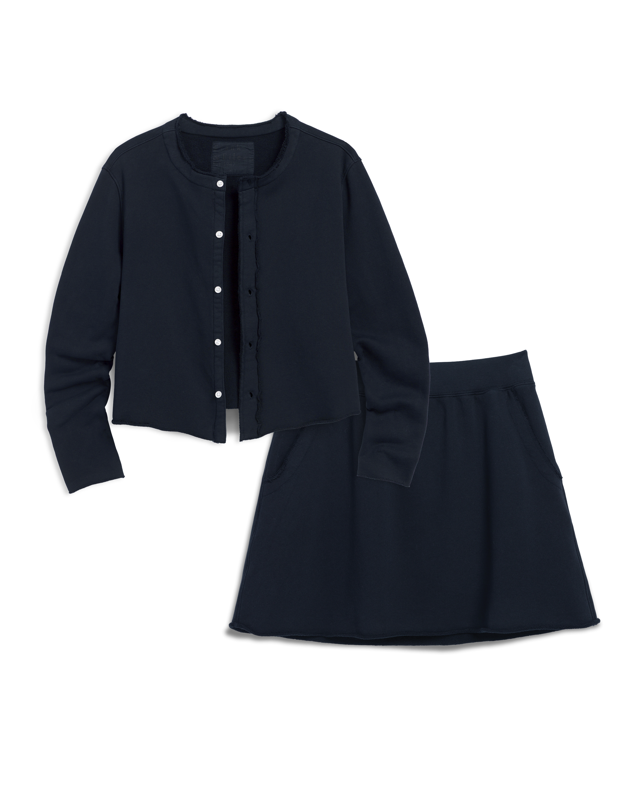 Navy blue outfit with jacket and skirt on a white background