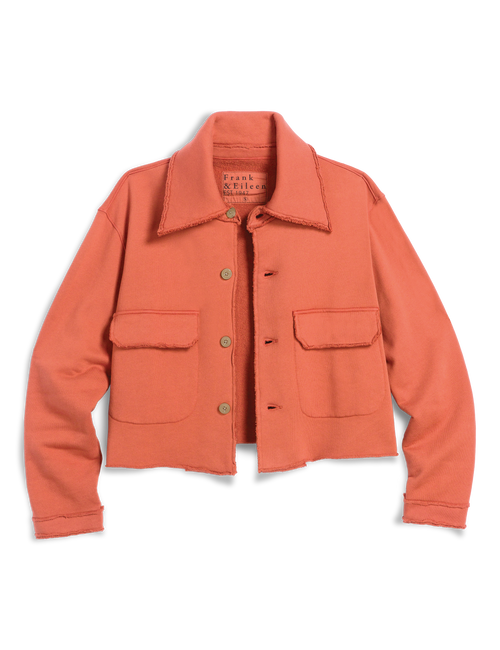 A cropped orange jacket with a pointed collar, button front, and two front flap pockets, photographed flat against a white background., view 5