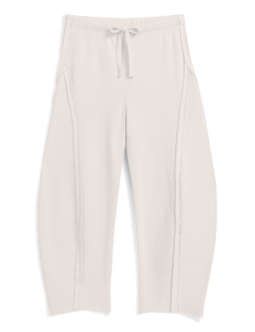 A pair of light beige barrel-leg cropped pants with a drawstring waistband, displayed against a plain white background., view 4