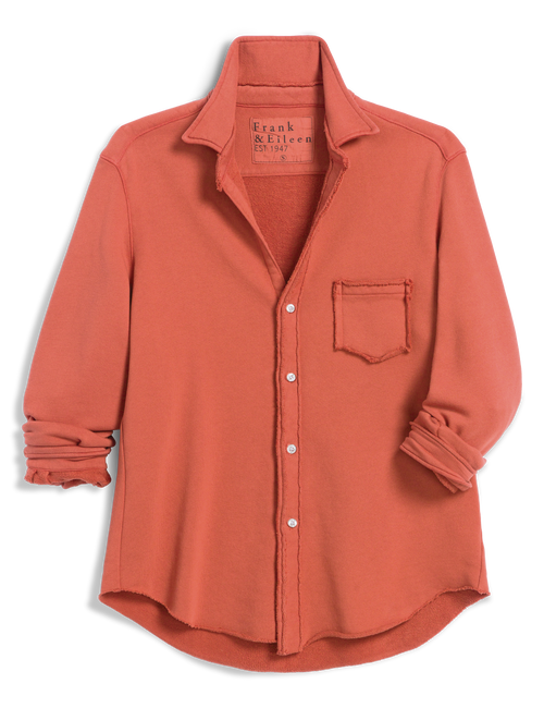A long-sleeve button-front shirt in a muted terracotta or burnt orange color, featuring a collar, a chest pocket, and rolled cuffs, photographed on a clean white background. The brand label inside the collar reads 'Frank & Eileen'., view 4