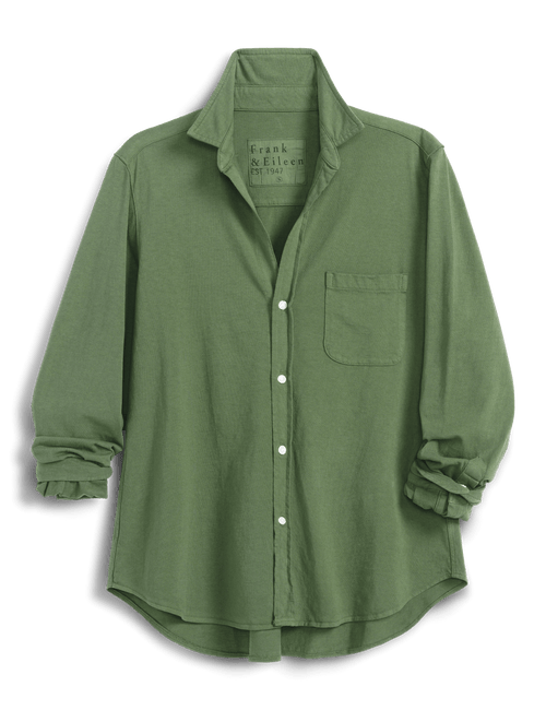 An olive green long-sleeve button-up shirt by Frank & Eileen, featuring a chest pocket and ruffled cuffs, displayed on a clean white background., front view