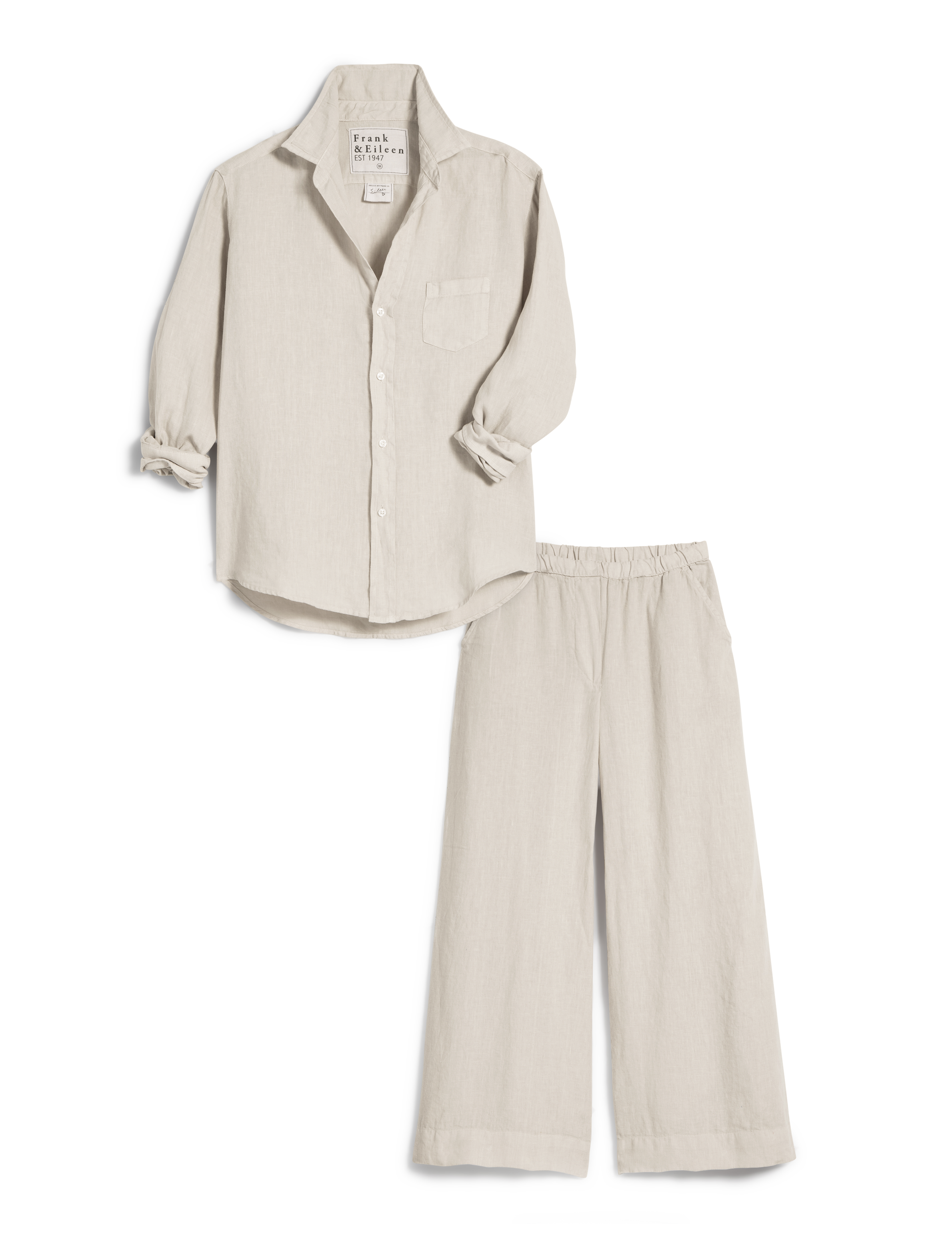 Beige shirt and pants set on a white background