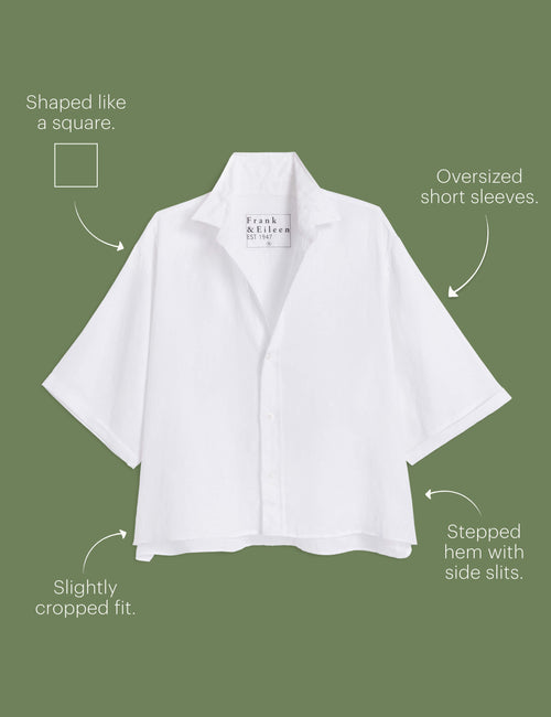 White shirt with design features labeled on a green background, view 6