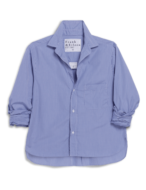 Blue shirt with brand label on a black background, front view