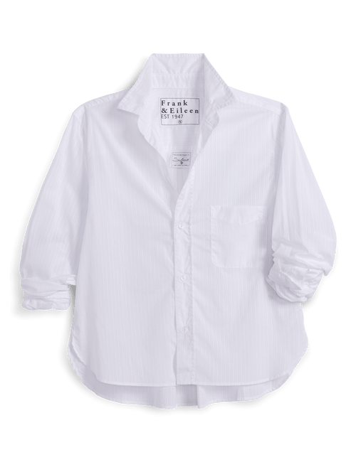 White shirt with brand label on a black background, front view