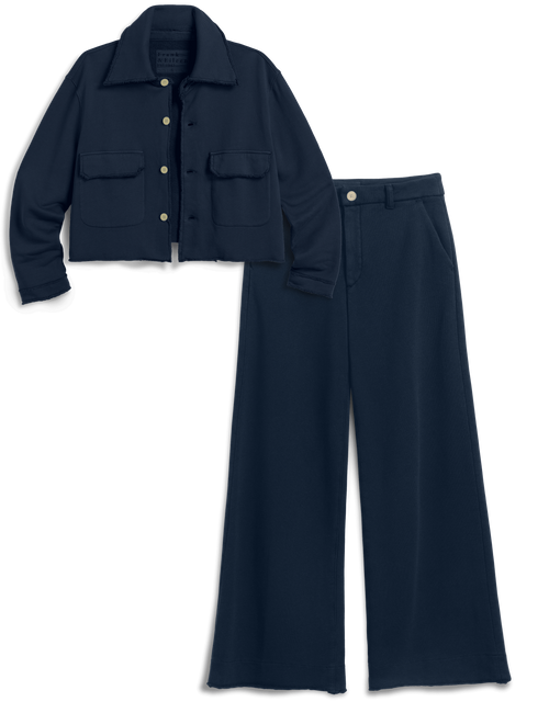 A navy blue two-piece outfit consisting of a cropped button-up jacket with flap chest pockets and matching wide-leg trousers, shown on a plain white background., view 6
