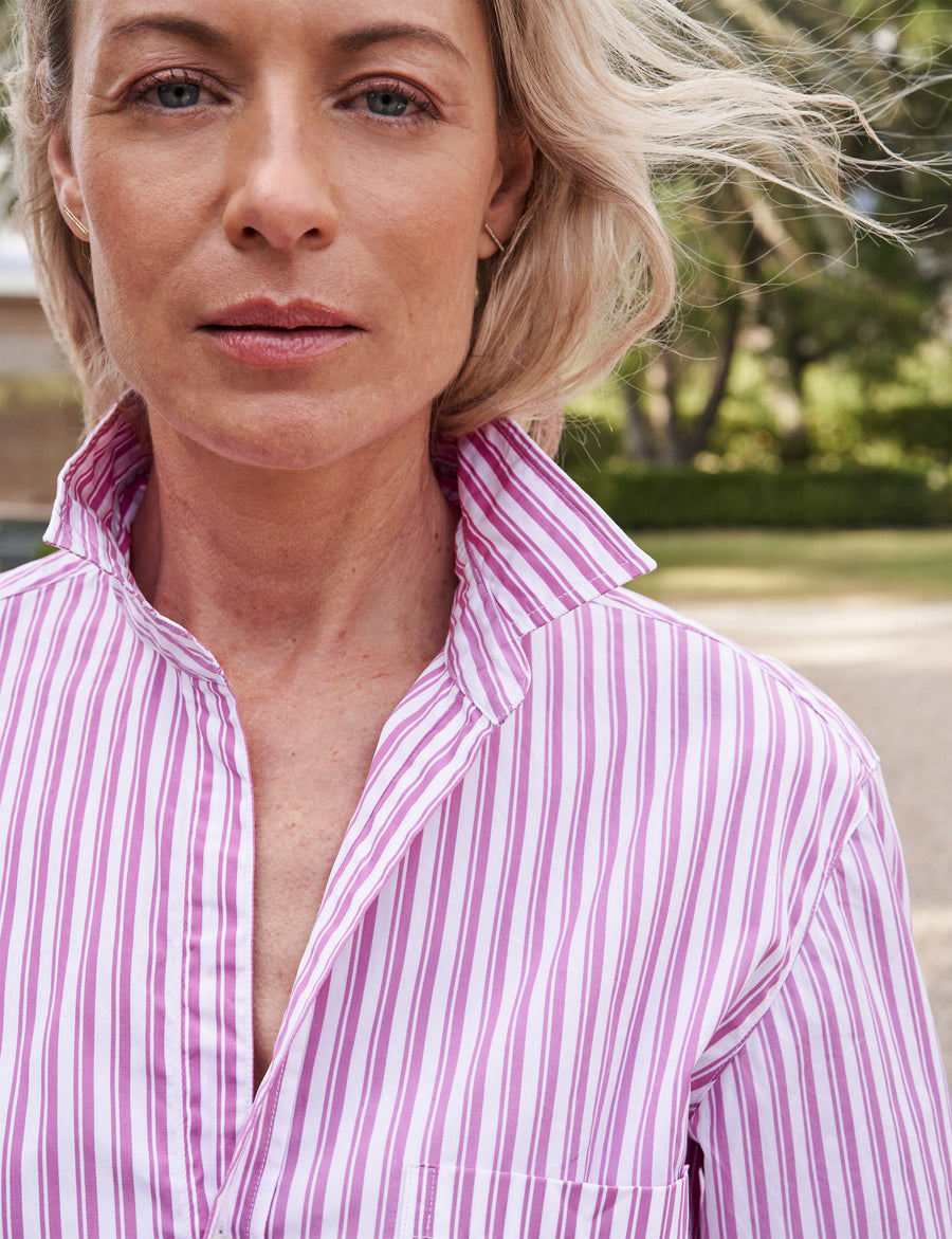 Face and collar of person wearing Pink Stripe Frank & Eileen Joedy Boyfriend Button-Up Shirt in Superfine