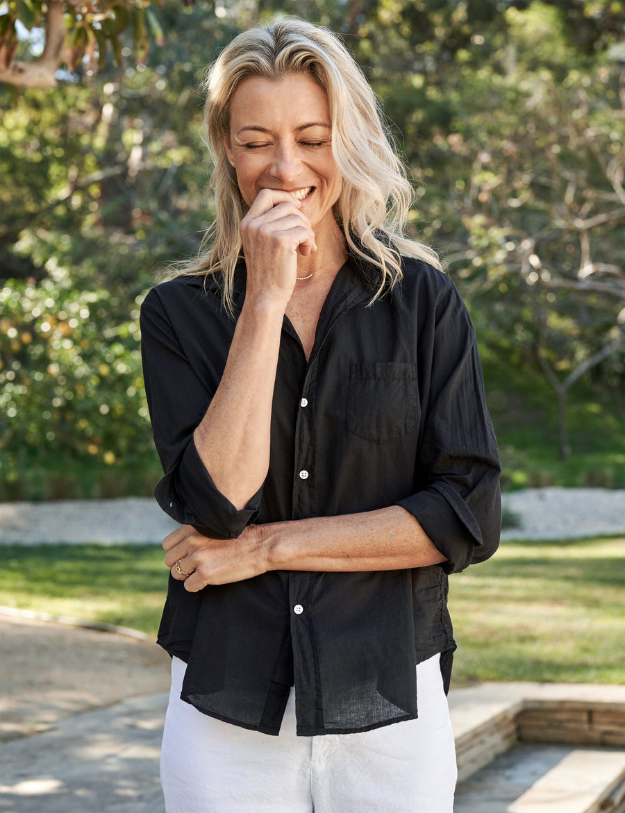 Upper body of person wearing Black Frank & Eileen Eileen Relaxed Button-Up Shirt in Organic Voile