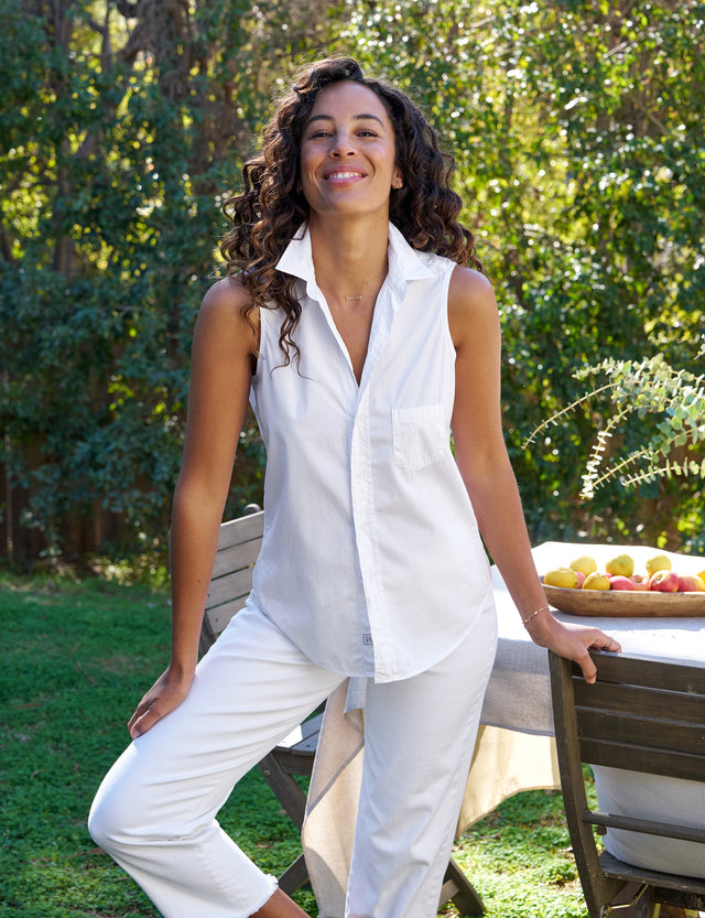 Front of person wearing White Frank & Eileen Fiona Sleeveless Button-Up Shirt in Superluxe