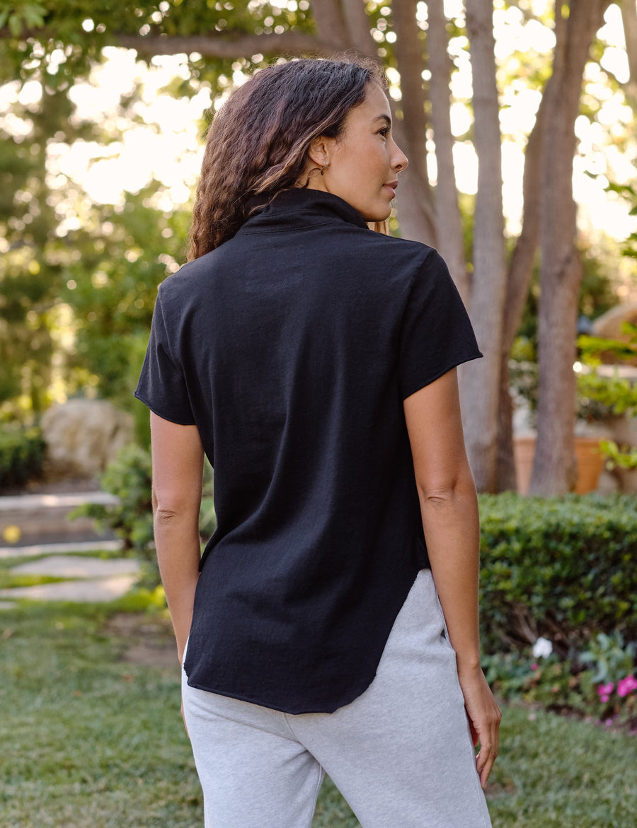 Back of person wearing Black Frank & Eileen Charlotte Short-Sleeve Polo in Heritage Jersey