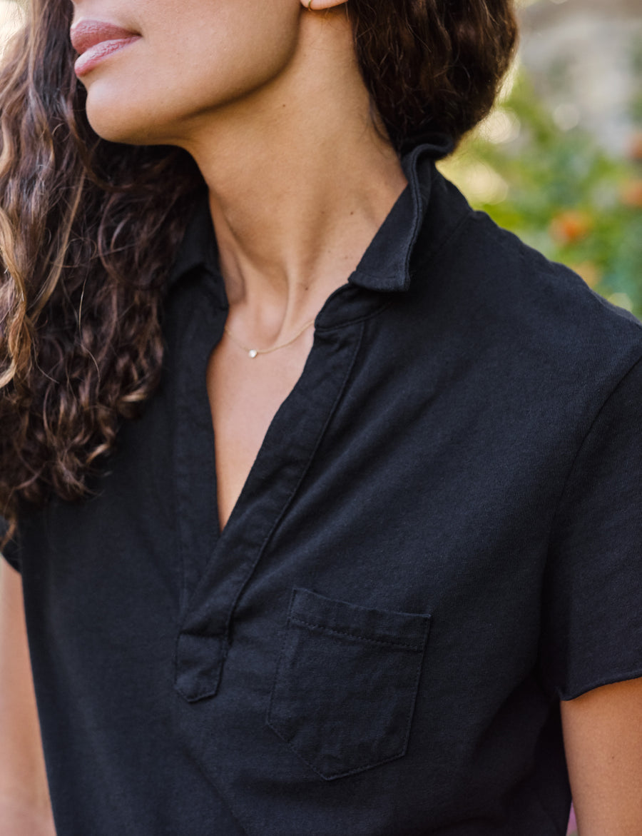Collar of person wearing Black Frank & Eileen Charlotte Short-Sleeve Polo in Heritage Jersey